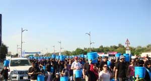 بلدية دبي تشارك في مسيرة دلو الماء الخيرية